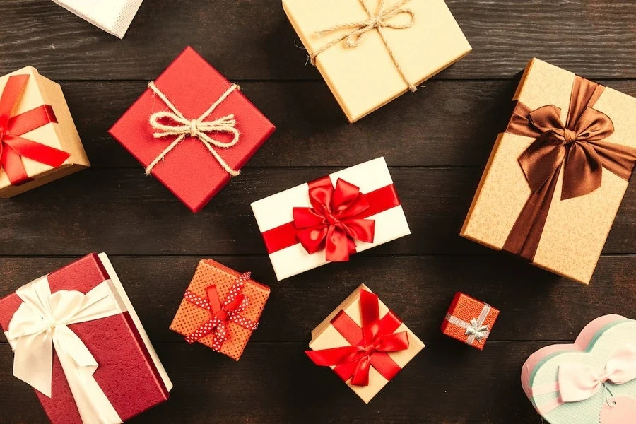 Gift boxes on a table wrapped with ribbons