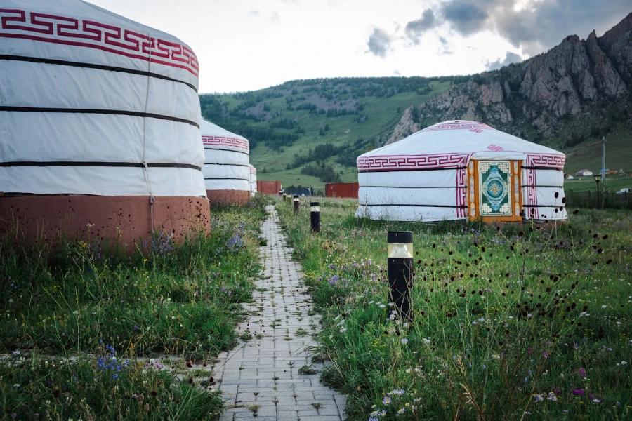 Mongolian yurt tents with colorful doorway flaps in center