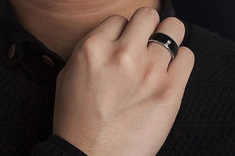 Person wearing a smart ring