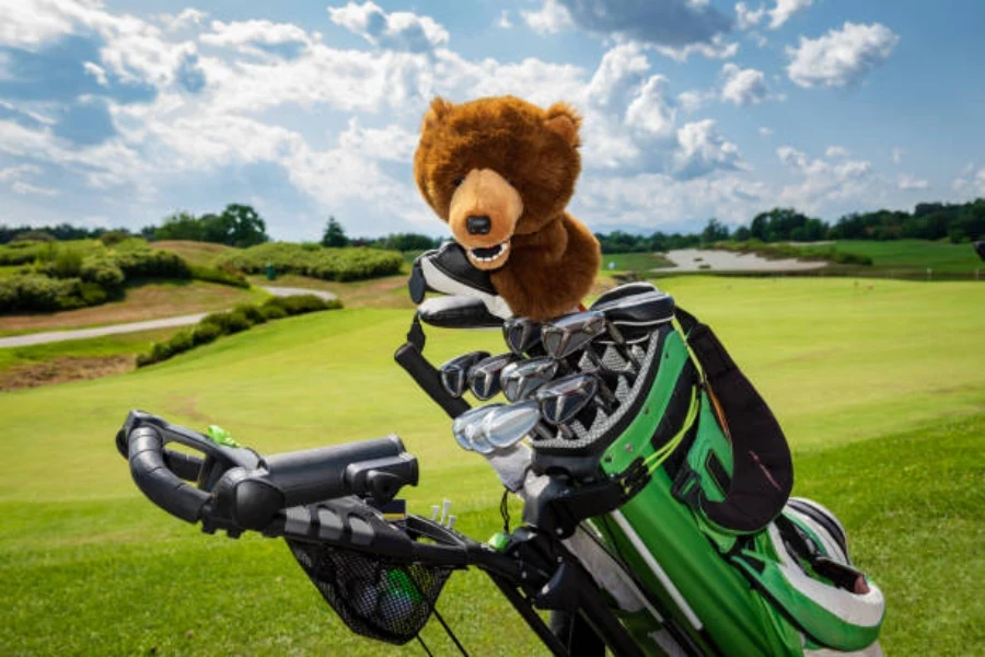 Soft bear golf club head cover poking out of bag