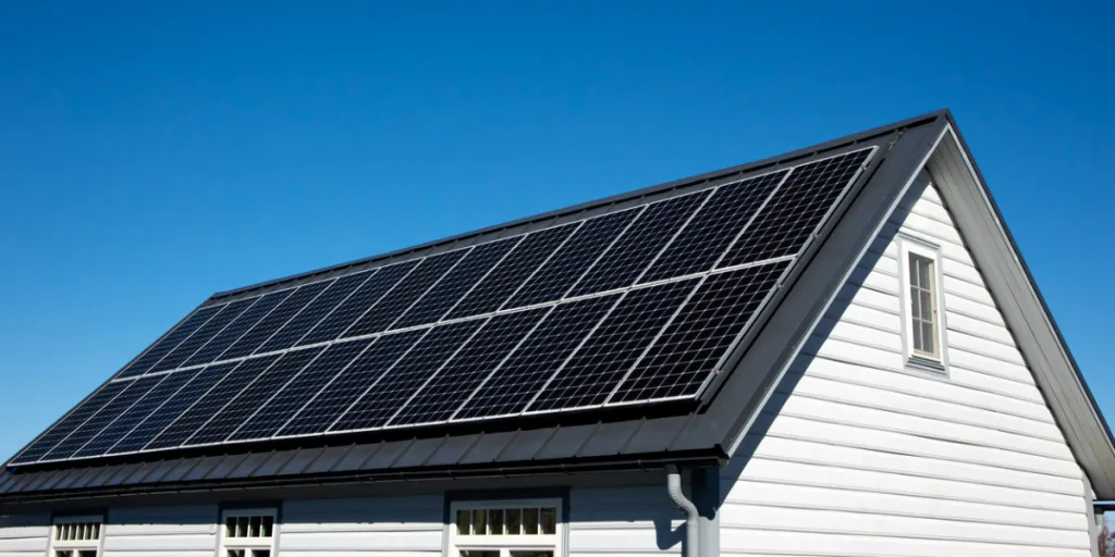 solar panels on small wood board domestic house roof
