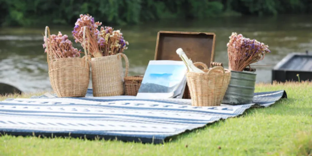 Waterproof picnic blanket laid out next to river