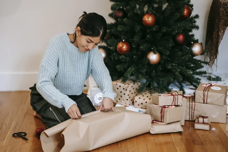 Woman using brown gift-wrapping paper