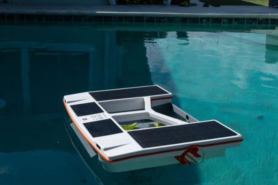 A floating, solar-powered pool skimmer