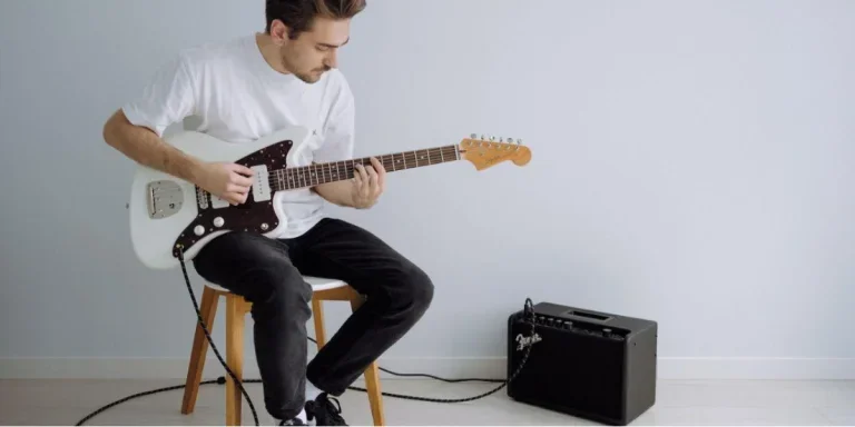 A man playing an electric guitar