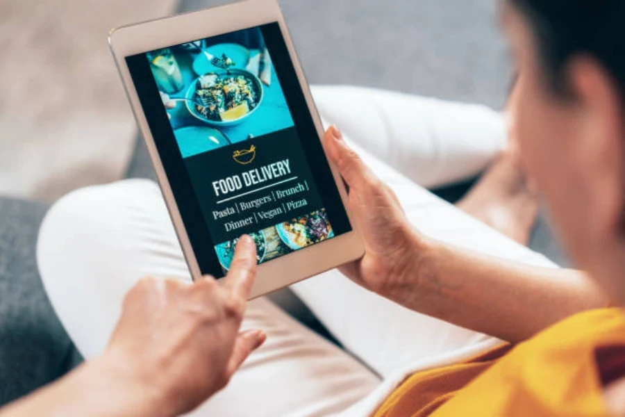 A man using an e-reader with a user-friendly interface