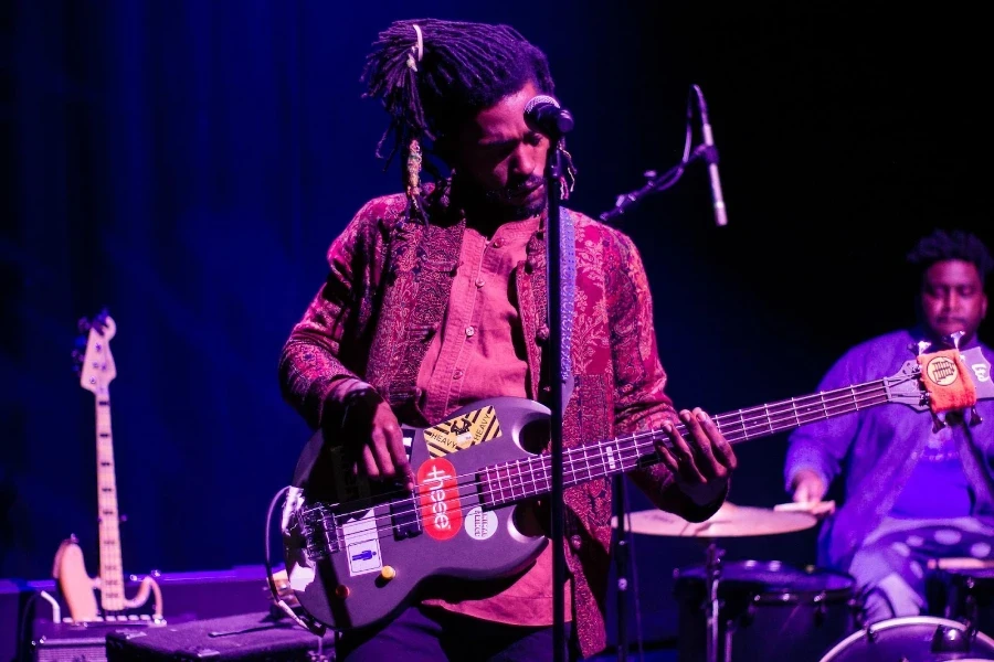 a musician playing a customized guitar