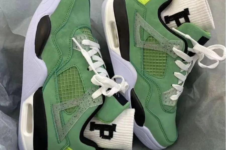 A pair of green eco-friendly basketball shoes