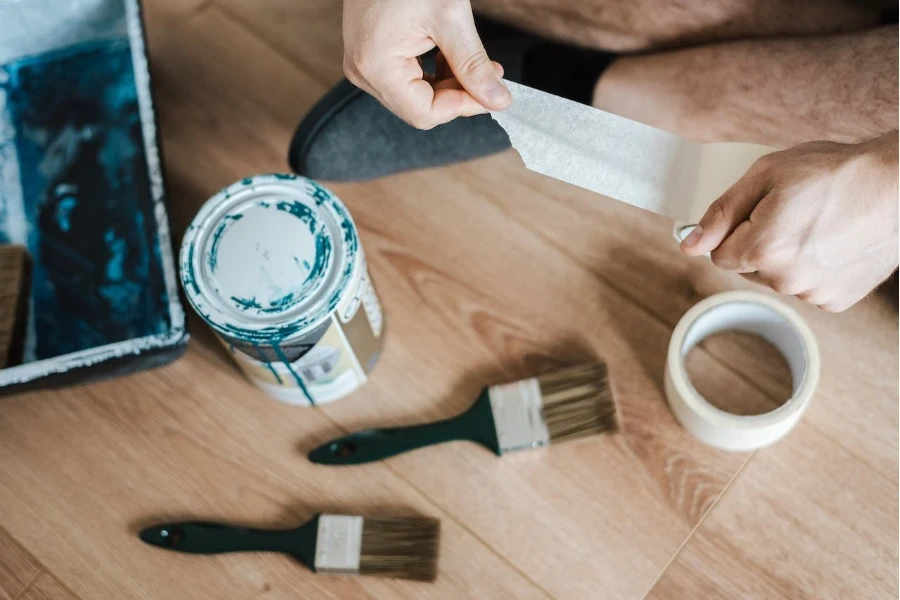 A person using scotch tape