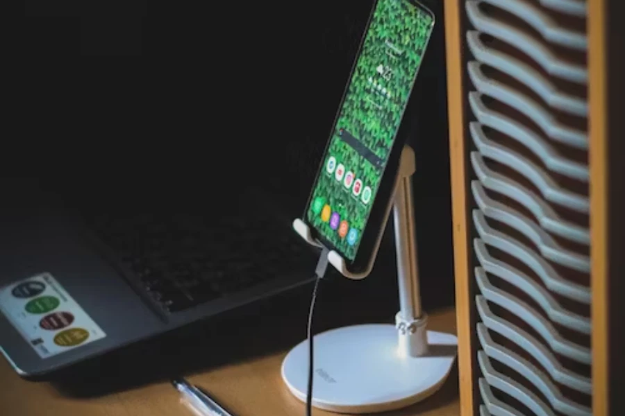 a smartphone placed on a foldable phone stand