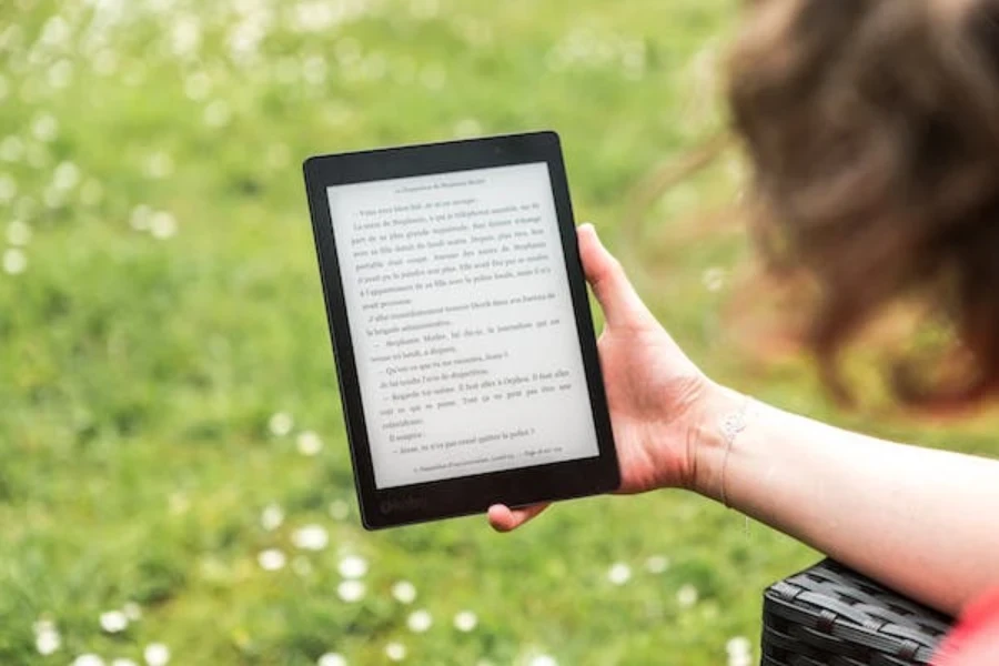 A woman using an e-reader