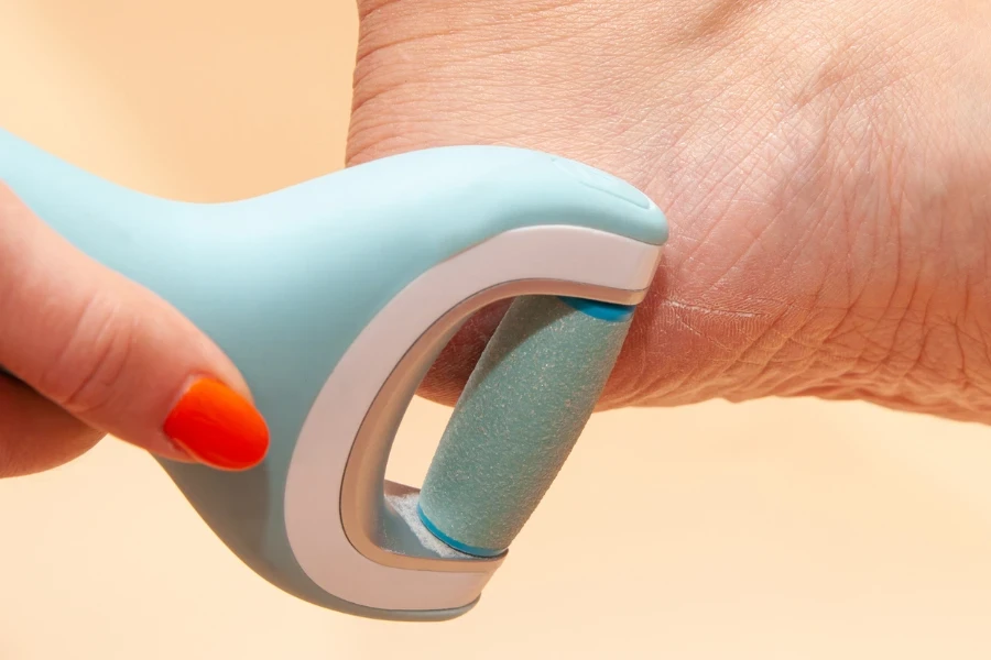 An electric callus remover used on callused feet