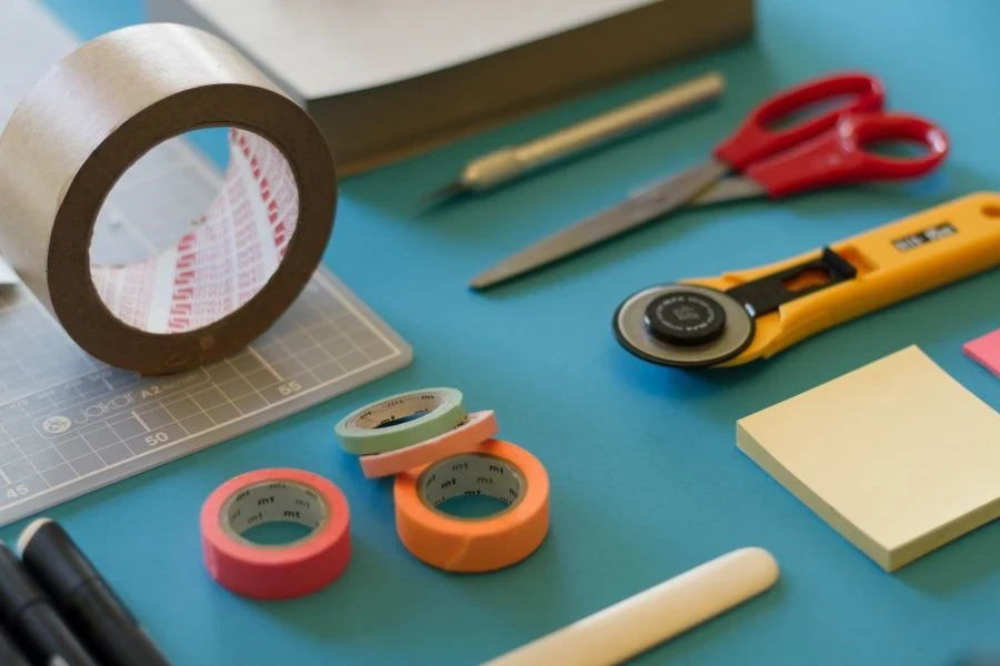 Assorted adhesive tape with other office supplies