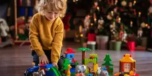 Boy playing with building blocks