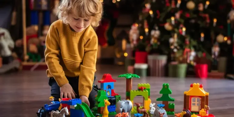 Boy playing with building blocks