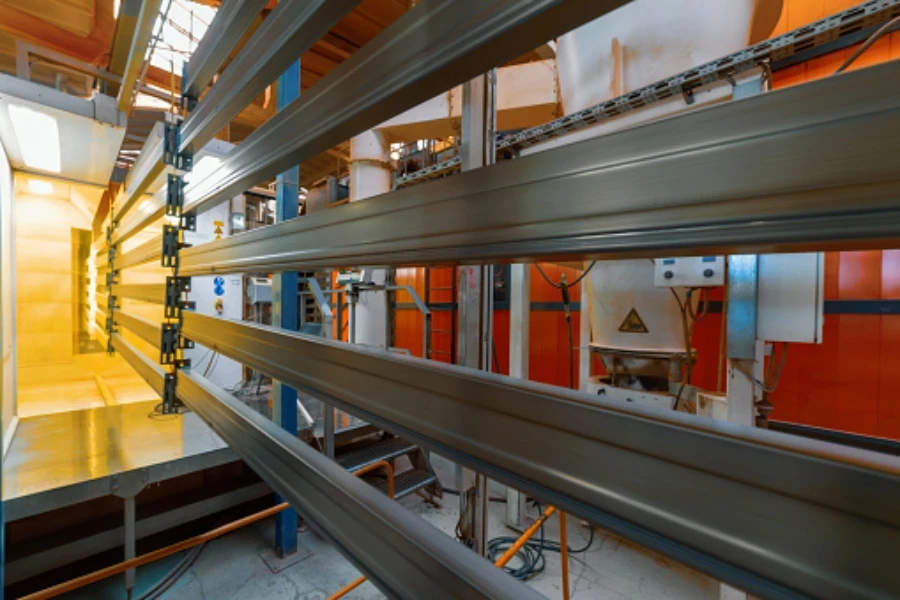 Coating process for large metal pieces in a factory