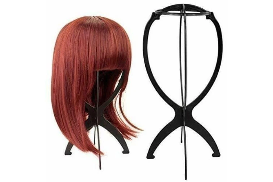 collapsible wig stands on a white background
