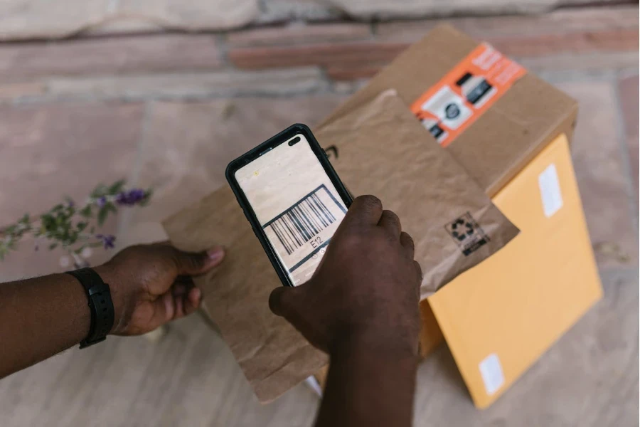 Deliveryman scanning the barcode