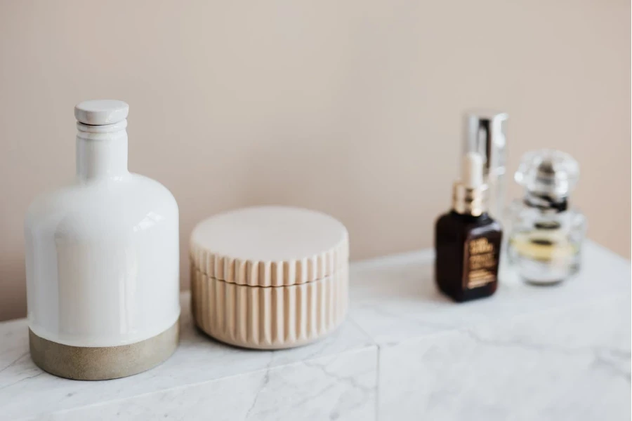 four jars on a marble top