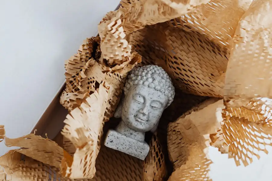 Granite Buddha statue in carton package