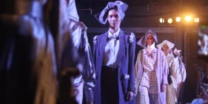 Group of women wearing dresses in a fashion show