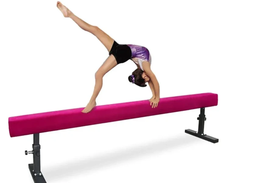 gymnast training on a balance beam
