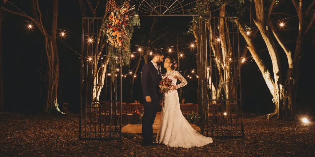 Iron gate wedding décor outside at night