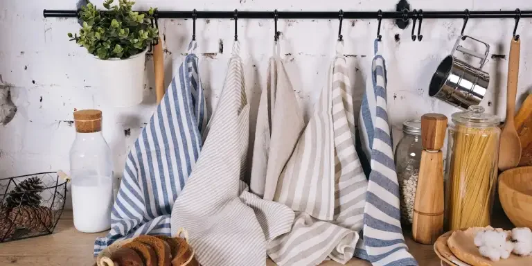kitchen towels hung in a kitchen