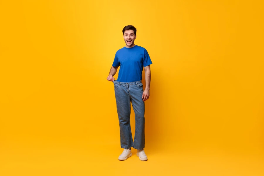 man in loose straight jeans