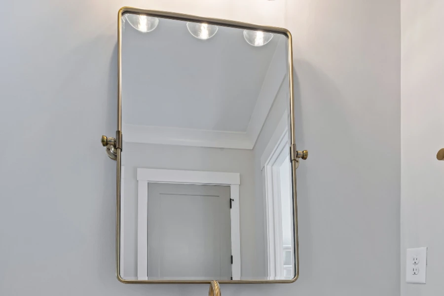 Metal frame pivot bath mirror