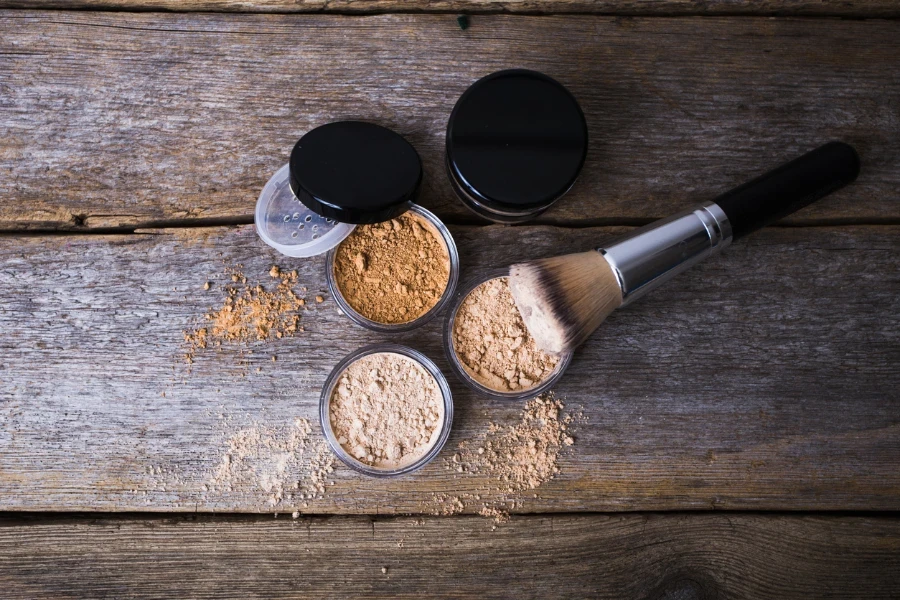 mineral powder of different colors with a brush