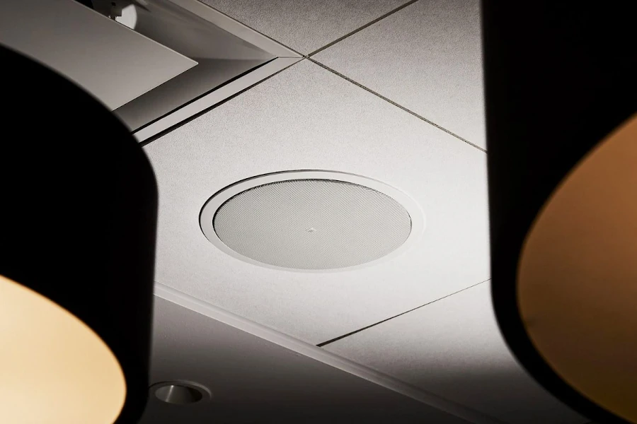 One architectural speaker on a modern ceiling