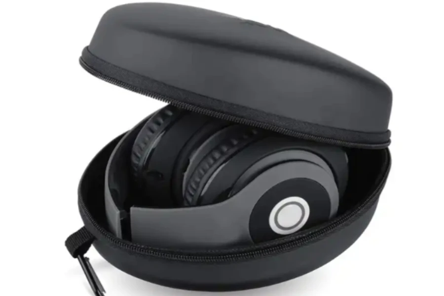 opened black headphone case with headphones