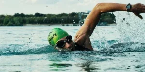 Person swimming in a lake