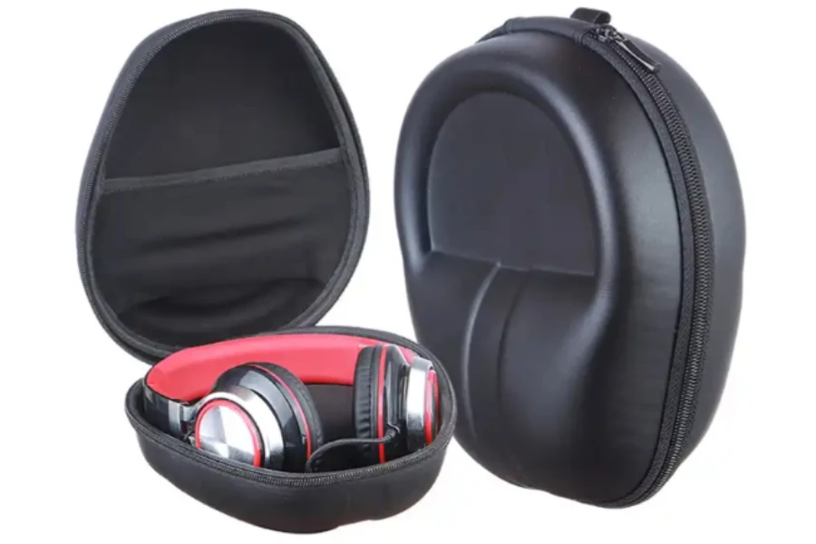 red headphones in a black EVA case