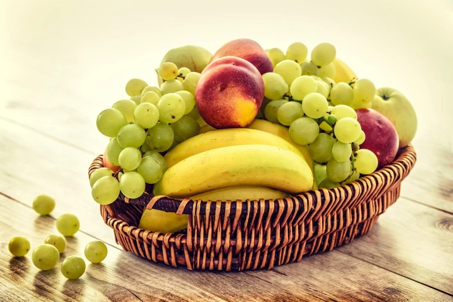 several types of fruit in a wicker basket