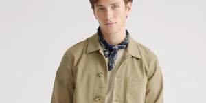 young man in chore jacket
