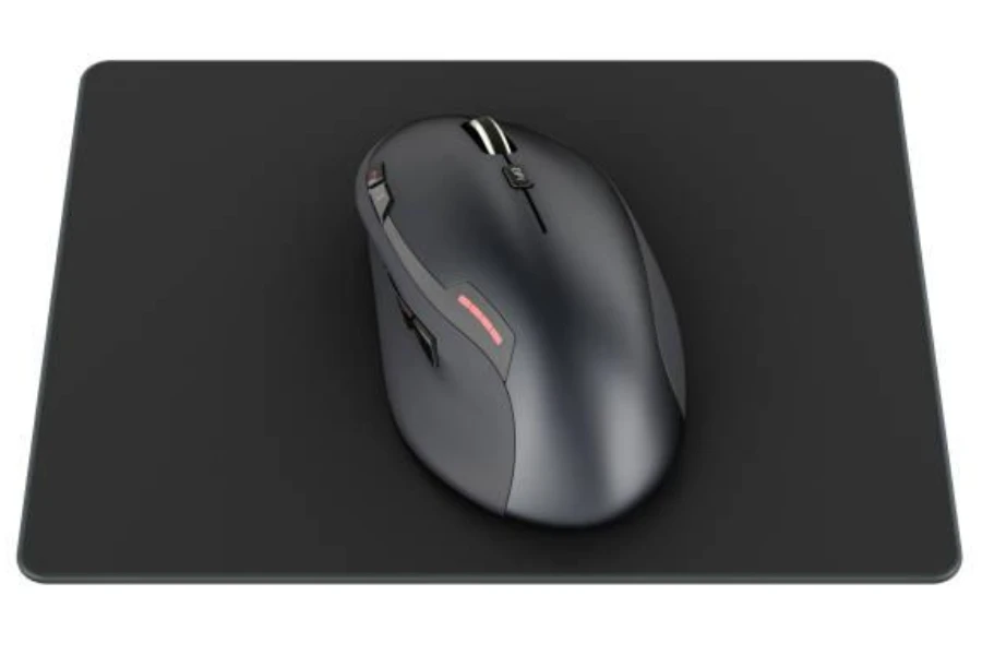 A black mouse on a black mouse pad