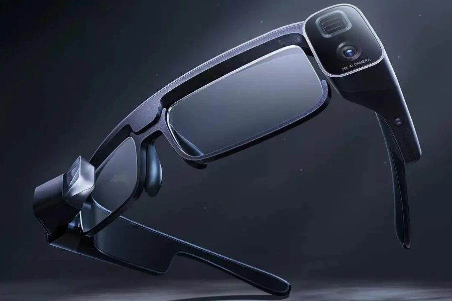 A black pair of AR glasses on a dark background
