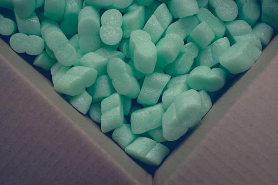 A box of green-colored loose-fill materials