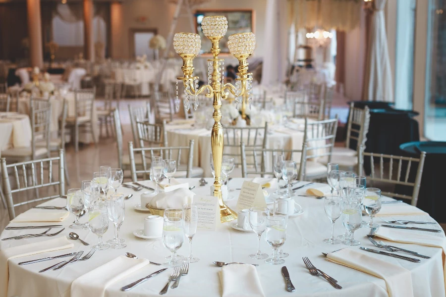 A candelabra kept at the center of a dining table