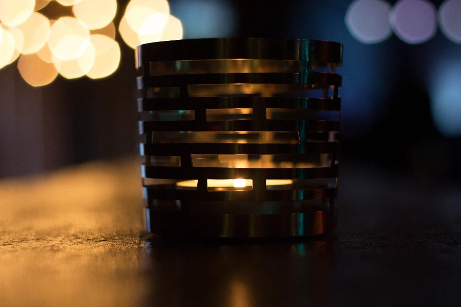 A cool candle lit inside a metal container