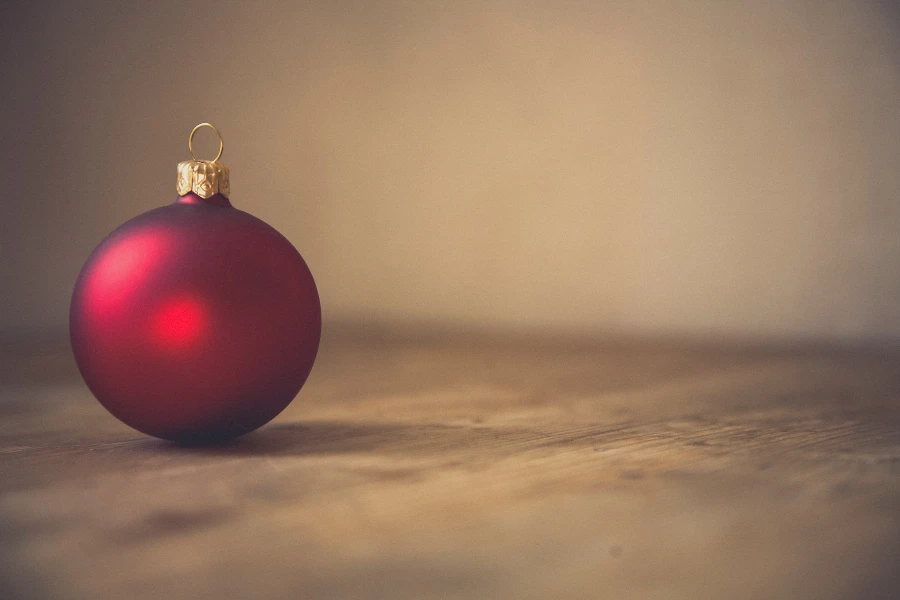 A deep red ornament on a surface