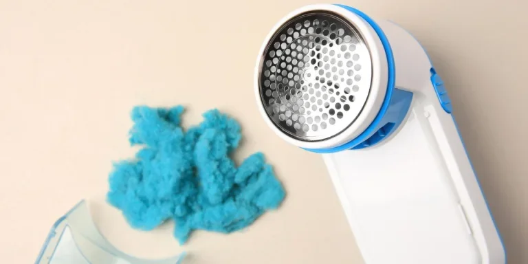 A disassembled lint remover with lints collected