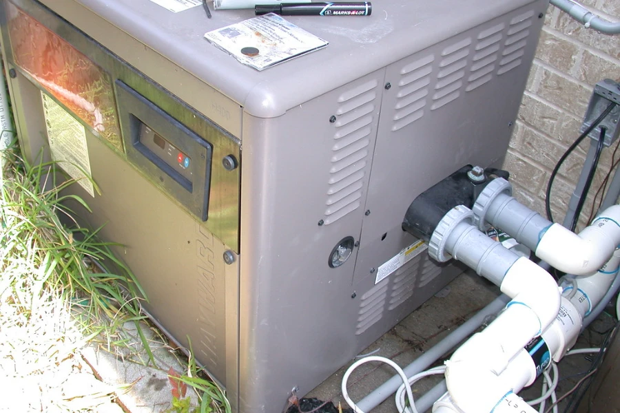 A gray gas-powered swimming pool heater