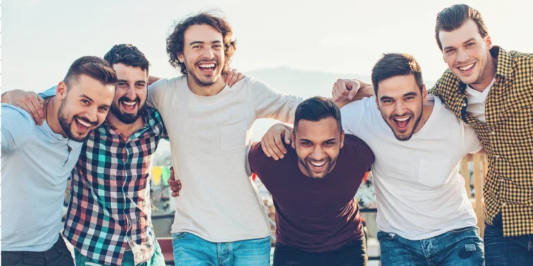 A group of happy men with full heads of hair