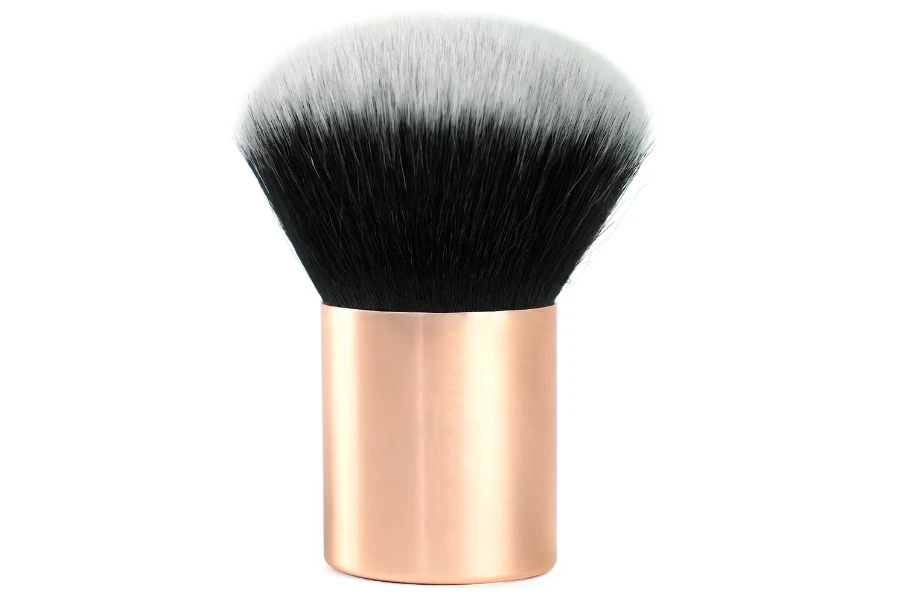 A kabuki brush on a white background