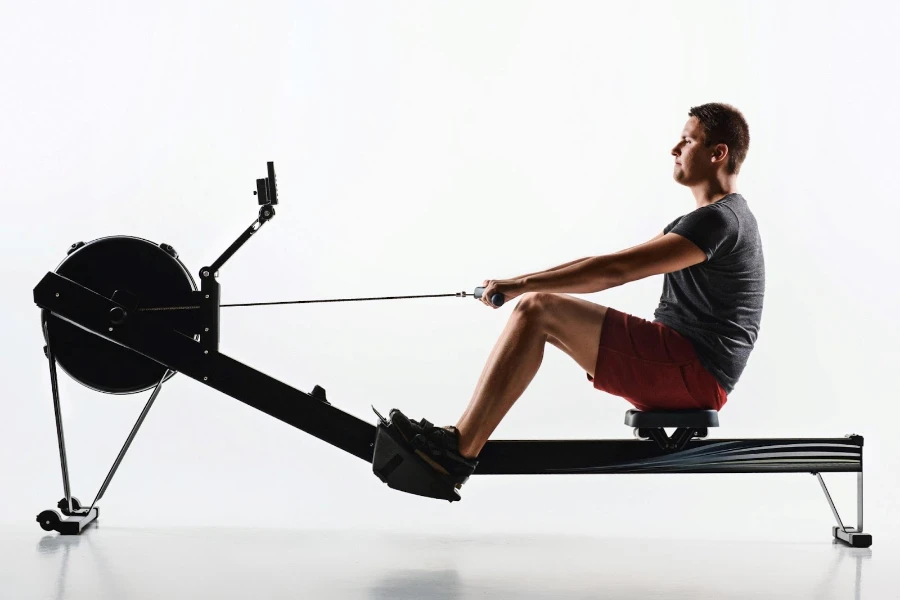 A man working out on a rowing machine
