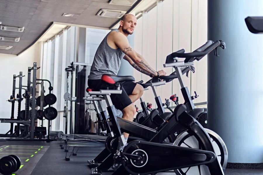 A man working out on a stationary bike