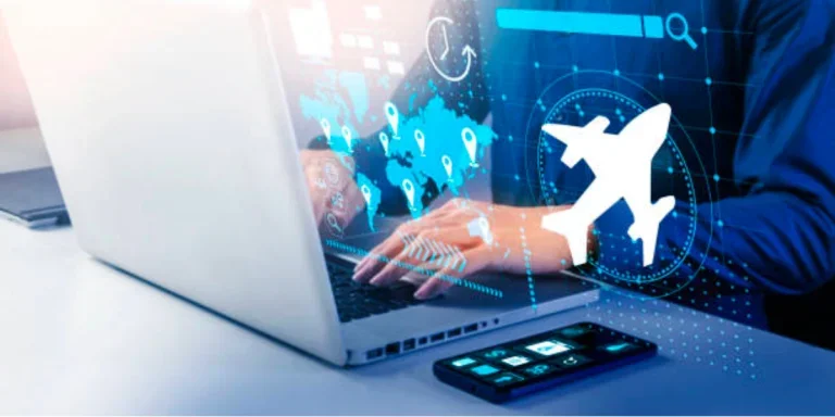 A person using travel tech on a laptop